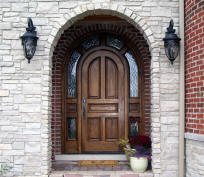 round top mahogany entry door