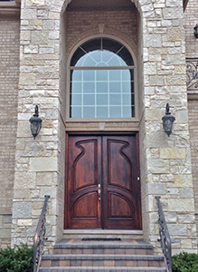 carved exterior mahogany double doors