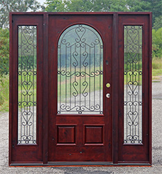 Alder exterior door with wrought iron glass